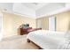 Cozy bedroom features neutral walls, carpet flooring, and a dresser with a TV at 4321 Timberwood Dr, Gastonia, NC 28056