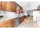 Traditional-style kitchen with stainless steel appliances and wood cabinetry at 4321 Timberwood Dr, Gastonia, NC 28056