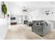 Cozy living room with a fireplace, large sectional sofa, and neutral décor at 4321 Timberwood Dr, Gastonia, NC 28056
