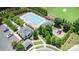 Aerial view of community pool, playground, clubhouse, and parking areas at 4386 Oldstone Dr, Harrisburg, NC 28075