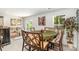 Dining area with a round table and decorative chairs near a patio door at 4386 Oldstone Dr, Harrisburg, NC 28075