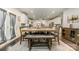 Bright dining room with a large table, stylish chairs, and access to the kitchen at 4386 Oldstone Dr, Harrisburg, NC 28075
