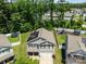 Aerial view of a single-Gathering home with a fenced backyard and solar panels at 5009 Granite Creek Ln, Charlotte, NC 28269