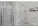 Bright bathroom with glass shower, soaking tub, and modern decor at 5009 Granite Creek Ln, Charlotte, NC 28269