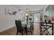 Elegant dining room with modern lighting and a spacious layout, perfect for entertaining guests and Gathering gatherings at 5009 Granite Creek Ln, Charlotte, NC 28269