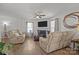 Cozy living room with comfortable seating, a fireplace, and a ceiling fan, ideal for relaxation and Gathering time at 5009 Granite Creek Ln, Charlotte, NC 28269