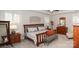 Well-lit primary bedroom with an accent wall, wooden furniture, and ample space at 5332 Pembrey Dr, Denver, NC 28037