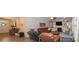Spacious living room featuring comfortable seating, a fireplace, and built-in shelving at 5332 Pembrey Dr, Denver, NC 28037