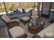 Comfortable screened-in porch offering stylish seating and a relaxing outdoor experience at 5332 Pembrey Dr, Denver, NC 28037