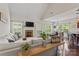 Open living area with fireplace, seamlessly connects to the kitchen and dining space at 5379 Roberta Meadows Ct, Concord, NC 28027