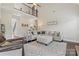 Bright living room featuring an upper-level landing and spacious seating area at 5379 Roberta Meadows Ct, Concord, NC 28027