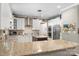 Well-equipped kitchen with stainless steel appliances, granite countertops, and ample storage space at 6006 Casswell Cir, Matthews, NC 28104