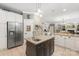 Bright kitchen featuring stainless steel appliances, granite countertops, and island with sink at 6006 Casswell Cir, Matthews, NC 28104