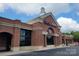 Exterior view of a Harris Teeter neighborhood market with brick facade and ample parking at 6006 Casswell Cir, Matthews, NC 28104