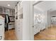 Walk-in closet leading to a luxurious bathroom with double vanity sinks, offering convenience and style at 6242 Creola Rd, Charlotte, NC 28270
