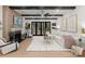 Spacious living room with elegant furnishings, hardwood floors, and a cozy fireplace at 6242 Creola Rd, Charlotte, NC 28270