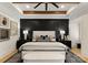 Well-decorated main bedroom featuring a tray ceiling and contrasting accent wall at 6242 Creola Rd, Charlotte, NC 28270