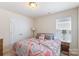 Comfortable bedroom featuring neutral colors and plush carpet at 6945 Agava Ln, Charlotte, NC 28215