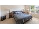 Cozy bedroom featuring a comfortable bed, side tables, and neutral decor at 6945 Agava Ln, Charlotte, NC 28215