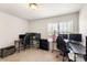 Bedroom featuring multiple desks, perfect for a home office or study space at 6945 Agava Ln, Charlotte, NC 28215