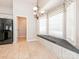 Cozy breakfast nook featuring a window seat and a decorative chandelier at 703 Bradberry Ln, Indian Trail, NC 28079