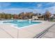 Community pool features a slide, wading pool, and covered seating areas at 703 Bradberry Ln, Indian Trail, NC 28079