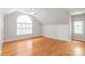Bright bedroom with vaulted ceiling and window offering a private retreat for rest and relaxation at 7301 Leharne Dr, Charlotte, NC 28270