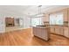 Eat in kitchen with island cooktop, stainless appliances, and lots of light at 7301 Leharne Dr, Charlotte, NC 28270