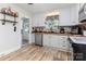 Well-lit kitchen with butcher block countertops, stainless steel appliances, and white cabinets at 810 Maplewood Ave, Kannapolis, NC 28081