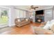 Inviting living room with hardwood floors, fireplace, and comfortable seating at 810 Maplewood Ave, Kannapolis, NC 28081