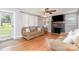 Inviting living room with hardwood floors, fireplace, and comfortable seating at 810 Maplewood Ave, Kannapolis, NC 28081