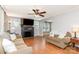 Inviting living room featuring a fireplace, ceiling fan, and hardwood floors at 810 Maplewood Ave, Kannapolis, NC 28081