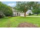 Charming two-story home with light brown siding, red shutters, well-manicured lawn, and attached two-car garage at 8618 Sam Dee Rd, Charlotte, NC 28215