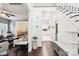 Spacious foyer with dark hardwood floors, white walls, and views into the living room, dining room, and kitchen at 8618 Sam Dee Rd, Charlotte, NC 28215
