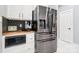 Modern kitchen appliances including a stainless steel refrigerator, microwave, and coffee maker at 8618 Sam Dee Rd, Charlotte, NC 28215