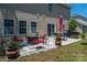 Inviting backyard patio featuring a fire pit and seating, perfect for outdoor gatherings and relaxation at 8909 Savannah Rd, Harrisburg, NC 28075