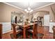 Elegant dining area with natural lighting and seamlessly connected to the inviting living room at 8909 Savannah Rd, Harrisburg, NC 28075