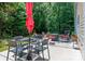 Relaxing patio offering comfortable seating and a shaded dining area, perfect for outdoor entertaining at 8909 Savannah Rd, Harrisburg, NC 28075