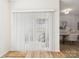Bright room with lots of light from patio doors and an attached dining area, showcasing an open floorplan at 9030 Gander Dr, Charlotte, NC 28277