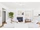 Bright living room with fireplace, neutral decor and furniture, and laminate flooring at 9030 Gander Dr, Charlotte, NC 28277
