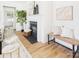 Bright living room featuring fireplace, neutral decor and laminate flooring at 9030 Gander Dr, Charlotte, NC 28277