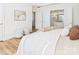 Bedroom with ensuite bathroom access; neutral colors and cozy furnishings at 9030 Gander Dr, Charlotte, NC 28277