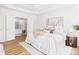 Spacious bedroom with an ensuite bathroom, ceiling fan and plenty of natural light at 9030 Gander Dr, Charlotte, NC 28277