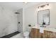 Stylish bathroom showcasing a sleek shower with marble-look tile and black fixtures at 922 Maurice St, Monroe, NC 28112