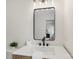 Bathroom vanity featuring wood-look cabinet, black hardware, and quartz countertop at 922 Maurice St, Monroe, NC 28112