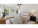Bright bedroom with large windows, plush bedding, and neutral decor creating a cozy, comfortable atmosphere at 922 Maurice St, Monroe, NC 28112