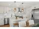 Modern kitchen with stainless steel appliances, white cabinetry, and a center island with seating at 922 Maurice St, Monroe, NC 28112