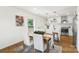 Bright kitchen with a breakfast nook, modern lighting, and an island with bar seating at 922 Maurice St, Monroe, NC 28112