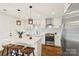 Bright kitchen featuring stainless steel appliances, white cabinetry, and quartz counters at 922 Maurice St, Monroe, NC 28112