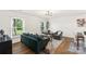 Inviting living room featuring hardwood floors, neutral walls, and comfortable seating at 922 Maurice St, Monroe, NC 28112